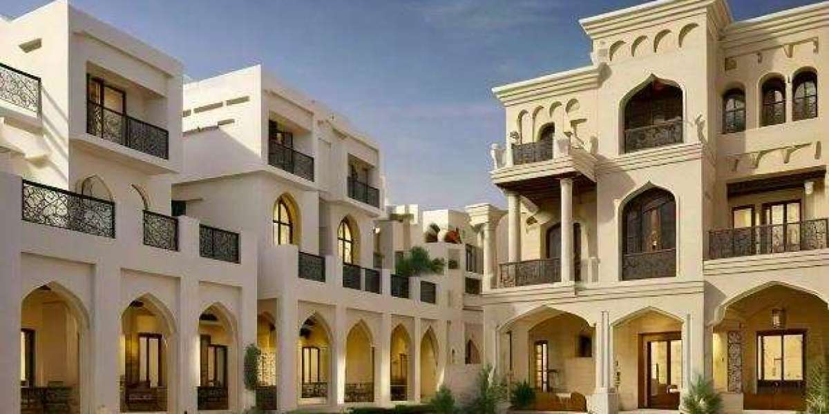 How do Townhouses For Sale in The Pearl Doha compare to apartments for families?